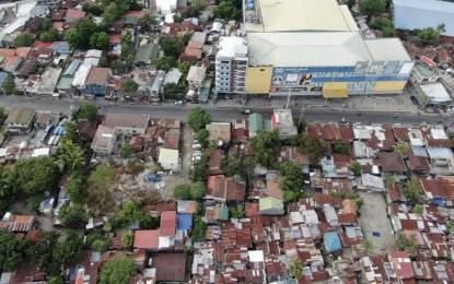 <p><strong>BACK TO ECQ</strong>. This aerial view shows the Sitio Alaska of Barangay Mambaling in Cebu City which continues to be the epicenter of coronavirus disease 2019 (Covid-19) crisis in Central Visayas, with 616 confirmed cases. Cebu City, along with Mandaue City, is implementing again strict measures under enhanced community quarantine (ECQ), following Resolution 37 of the Inter-Agency Task Force for the Management of Emerging Infectious Disease (IATF-EID) declaring the two highly-urbanized cities as high risk. <em>(Photo courtesy of Jun Nagac)</em></p>
<p> </p>