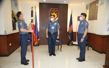 <p><strong>NEW DPCR CHIEF.</strong> PNP chief, Gen. Archie Gamboa (center), leads the change of command ceremony of the Directorate for Police Community Relations (DPCR) in Camp Crame on Wednesday (May 20, 2020). Maj. Gen. Dionardo Carlos (right) assumed as the new DPCR chief replacing Maj. Gen. Benigno Durana Jr. (left) who retired from the service. <em>(Photo courtesy of PNP Public Information Office)</em></p>