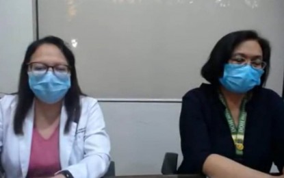 <p><strong>TESTING CAPACITY BOOSTED</strong>. Dr. Stephanie Abello (left), chief pathologist of Western Visayas Medical Center sub-national laboratory, says on Wednesday (May 20, 2020) that the testing capacity of the coronavirus disease 2019 laboratory is expected to increase from 500 to 1,000 daily. She said the laboratory has acquired a new automated Ribonucleic acid extraction machine that will help in the testing. <em>(Photo courtesy of DOH 6)</em></p>