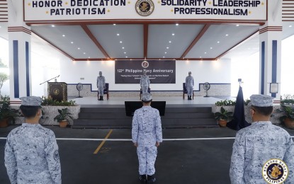 <p><strong>TRIBUTE TO FRONT-LINERS.</strong> Navy personnel offer a moment of silence to honor front-liners during the celebration of the Philippine Navy's 122nd anniversary in its headquarters in Manila on Wednesday (May 20, 2020). The occasion, which was only attended by selected PN personnel who strictly observed physical distancing, was witnessed by Navy units and the public via Facebook Live and video conferencing. <em>(Photo courtesy of the Naval Public Affairs Office)</em></p>