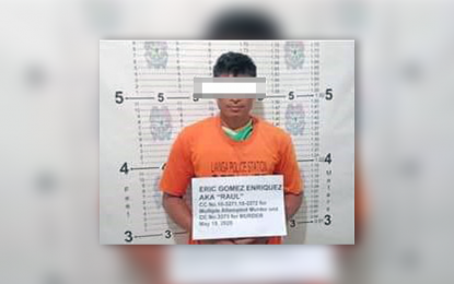 <p><strong>NPA COURIER.</strong> Police and Army operatives arrest Eric G. Enriquez, allegedly a courier for the communist New People's Army, in a law enforcement operation in the vicinity of Barangay Diatagon, Lianga, Surigao del Sur on May 19, 2020. Military and law enforcement officials said the area is a known enclave of the communist rebel group. <em>(Photo courtesy of PRO-13 Information Office)</em></p>