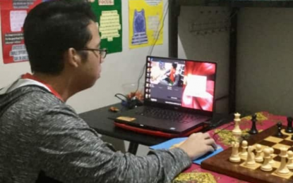 <p><strong>PRIDE OF DAVAO CITY.</strong> International Master John Marvin Miciano competes in the online National Juniors Rapid Online Chess Championship on May 12 and 13, 2020. The 20-year-old pride of Davao City won the event to book ticket for the zonal qualifiers of the Asian Junior Rapid Online Chess Championship slated from May 26 to June 3. <em>(Contributed photo)</em></p>