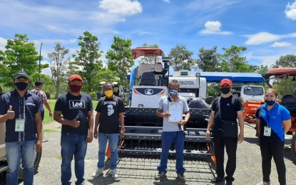 <p><strong>AGRICULTURAL INTERVENTION PROGRAM.</strong> Representatives of farmer organizations in Talakag, Bukidnon receive a farm tractor which is part of the Department of Agriculture Region 10's (DA-10) agricultural intervention program. The DA-10 has provided PHP6.1 million worth of machinery to farmers organizations in the area. <em>(Photo courtesy DA-10)</em></p>
<p> </p>