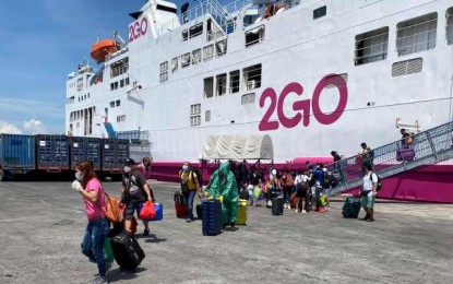 <p><strong>RETURNING OFWs.</strong> A total of 228 overseas Filipino workers (OFWs) arrive at the city’s Bredco port aboard 2GO Group’s St. Therese of Child Jesus on Monday morning (May 25, 2020). Malacañang said it respects some local government units’ move to let returning OFWs undergo a second round of facility-based quarantine before returning to their respective homes. <em>(Photo courtesy of Bacolod City DRRMO)</em></p>