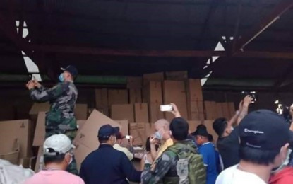 <p><strong>FAKE CIGARETTE FACTORY.</strong> Authorities led by the National Bureau Investigation, Bureau of Customs, Bureau of Internal Revenue and policemen seize millions of pesos worth of counterfeit cigarettes in series of raids from May 22 to 23 in three areas in Pagadian City, Zamboanga del Sur. The team also recover eight boxes of counterfeit documentary stamps worth PHP64 million. NBI Regional Director Moises Tamayo says Tuesday (May 26, 2020) that investigation is underway to determine the owners/operators of the illegal cigarette factories. <em>(PNA photo by Leah D. Agonoy)</em></p>