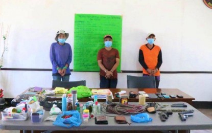 <p><strong>ARRESTED.</strong> The suspected communist New People’s Army rebels and the subversive documents, guns, and explosives recovered from them during law enforcement operations in Matalam, North Cotabato on Wednesday (May 27, 2020). The suspects are now detained at Matalam municipal police office awaiting the filing of formal charges against them. <em>(Photo courtesy of 602IBde)</em></p>