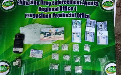 <p><strong>PANGASINAN BUY-BUST.</strong> Authorities confiscate PHP374,000 worth of suspected shabu, among other items, in a buy-bust in Rosales, Pangasinan on Thursday (May 28, 2020). The operation resulted in the arrest of high-value target Marvin Placido. <em>(Photo courtesy of PDEA Pangasinan)</em></p>
