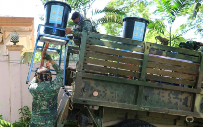 <p><strong>HEALTH ADVOCATES.</strong> Members of Marine Battalion Landing Team 2 (MBLT-2) unload anti-coronavirus disease 2019 (Covid-19) handwashing provisions donated by the United Nations Children's Fund to be used by the people of Datu Blah Sinsuat, Maguindanao. The MBLT-2, which has been transferred to the coastal municipality, vowed to push peace and environmental programs in the area. <em>(Photo courtesy of Datu Blah Sinsuat MIO)</em></p>
<p> </p>