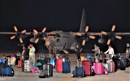 <p><strong>BACK HOME</strong>. A Philippine Air Force C-130 aircraft from Manila landed at Bacolod-Silay Airport around 7:20 p.m. on Saturday (May 30, 2020), bringing home a group of repatriated overseas Filipino workers. The passengers included 16 who are residents of Bacolod City, and 24 others from Negros Occidental.<em> (Photo courtesy of PIO Negros Occidental)</em></p>