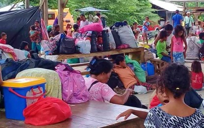 <p><strong>ON SAFER GROUND.</strong> Some of the 900 Teduray families from the villages of Kuya, Pilar, and Pandan in South Upi town, Maguindanao, are now staying at eight temporary shelters in the vicinity of Barangay Kuya. The evacuees received assistance from the Bangsamoro Autonomous Region in Muslim Mindanao government on June 1, 2020. <em>(Photo courtesy of READI-BARMM)</em></p>
