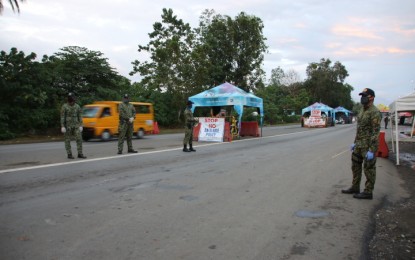 <p><strong>CHECKPOINTS TO STAY.</strong> Checkpoints will remain following the national government order placing Carara Region under the Modified General Community Quarantine starting June 1, 2020.  Local officials advised the public to continue observing health protocols and to go out of their homes only when necessary. <em>(PNA file photo by Alexander Lopez)</em></p>