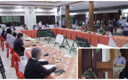 <p><strong>MEETING WITH COUNTERPARTS.</strong> Officials of the National Inter-Agency Task Force on coronavirus disease 2019 meet with counterparts in the Bangsamoro Autonomous Region in Muslim Mindanao on Thursday (June 4) at the headquarters of the Army’s 6th Infantry Division in Datu Odin Sinsuat, Maguindanao, to update and coordinate moves in fighting the deadly virus. Secretary Carlito Galvez Jr. (inset), chief implementer of the national government's policy against Covid-19, has lauded the quick response of the Bangsamoro IATF to combat Covid-19 in the region. <em>(Photo courtesy of BPI-BARMM)</em></p>