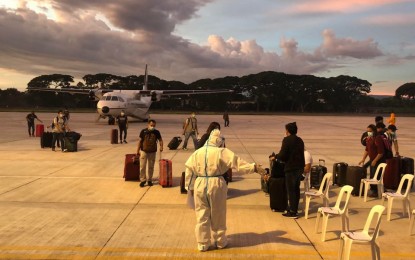 <p><strong>RETURNING RESIDENTS.</strong> A total of 16 returning overseas Filipinos arrived early Thursday evening (June 4, 2020) at the Dumaguete-Sibulan airport in Negros Oriental. These past days have seen the influx of returning residents to the province, including OFWs and locally-stranded individuals after the easing of border control measures.<em> (Photo courtesy of Bebsy Colaljo Lamis/Provincial Tourism Unit)</em></p>