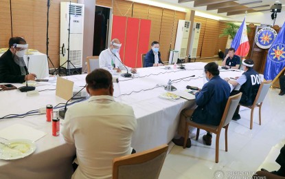 <p><strong>PRRD-IATF MEETING RESET.</strong> President Rodrigo Duterte holds a meeting with members of the Inter-Agency Task Force for the Management of Emerging Infectious Diseases (IATF-EID) at the Matina Enclaves in Davao City on June 4, 2020. Malacañang said Duterte’s next meeting with the task force was reset from June 11 to June 15 and will be held in Manila. <em>(Presidential photo by Robinson Niñal)</em></p>