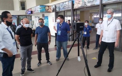 <p><strong>AIRPORT INSPECTION.</strong> Negros Occidental Governor Eugenio Jose Lacson (right) on Monday (June 8, 2020) inspects the installation of thermal scanners at the Bacolod-Silay Airport in preparation for the arrival of more sweeper flights until Thursday. He is joined by (from left) airport manager Percy Malonesio, Provincial Administrator Rayfrando Diaz II, Third District Board Member Andrew Montelibano, and Silay City Mayor Mark Golez.<em> (Photo courtesy of PIO Negros</em> Occidental)</p>