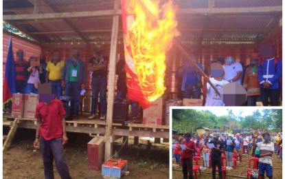 <p><strong>REBELS NO MORE.</strong> Members of 'Yunit Militia' of the communist New People’s Army (NPA) West Daguma Front Regional torch the NPA flag as they renounce allegiance to the terror group in Lebak, Sultan Kudarat, Maguindanao on Sunday (June 7, 2020). The group vowed to never again join the NPA movement as they pledge their commitment to the government (inset) to become peaceful and productive citizens. <em>(Photo courtesy of 6IB)</em></p>