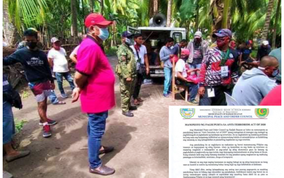<p><strong>NO TO TERROR.</strong> Mayor Yacob Ampatuan (center) of Rajah Buayan, Maguindanao helps educate his constituents about the proposed anti-terrorism act and its benefits to his town. The town’s peace and order council has issued a manifesto (inset) on Friday (June 12, 2020) denouncing the presence of the Daesh-inspired Bangsamoro Islamic Freedom Fighters in the marshlands near their area. <em>(Photo courtesy of Rajah Buayan LGU)</em></p>