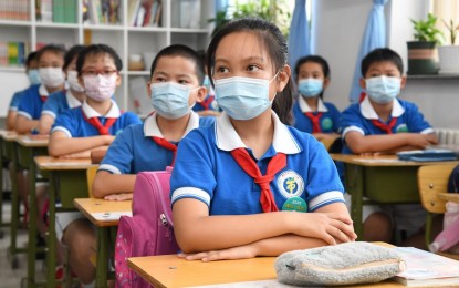 <p>Fourth-graders attend a class at Yangfangdian central primary school in Haidian District of Beijing, capital of China, June 8, 2020. <em>(Xinhua/Ren Chao)</em></p>