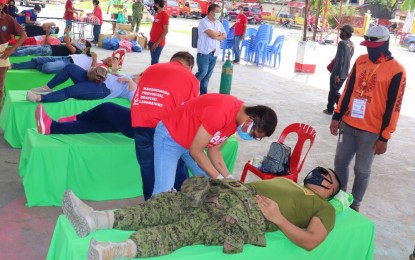 <p><strong>BLOOD DONATION. </strong>Soldiers and civilians donate blood in an activity initiated by the Army's 57th Infantry Battalion in Datu Piang, Maguindanao on Saturday (June 13, 2020). Civilians in the Army unit's area of jurisdiction also joined the bloodletting activity. <em>(Photo courtesy of 57IB)</em></p>