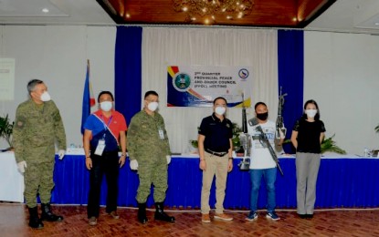 <p><strong>NEW LIFE.</strong> Agusan del Norte Governor Dale Corvera (3rd from right); Agusan del Norte 2nd District Rep. Maria Angelica Amante-Matba (right); Army 402nd brigade commander, Brig. Gen. Maurito Licudine (3rd from left); and 23IB commander Lt. Col. Julius Cesar Paulo (left), spearhead the turnover of the Enhanced Comprehensive Local Integration Program (ECLIP) benefits to 21 former rebels on Monday (June 15, 2020) in Butuan City. Each of the former rebels received PHP86,000 as immediate livelihood and re-integration assistance, as well as hygiene kits from the Department of Health in Caraga Region (DOH-13). <em>(Photo courtesy of 23IB)</em></p>