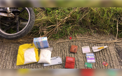 <p><strong>SEIZED.</strong> The suspected shab and personal belongings recovered from slain suspect Tohami Kamsa following a shootout with the police agents an entrapment operation in Barangay Poblacion, Cotabato City on Monday (June 15, 2020). The recovered shabu, estimated to weigh two kilos, has a street value of PHP13.5-million. <em>(Photo courtesy of Brigada New – Cotabato)</em></p>