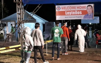 <p><strong>BACK HOME.</strong> The first batch of individuals stranded in Metro Manila assisted by the national government arrive in Palo, Leyte in this May 21, 2020 photo. The local government of Kananga, Leyte announced on Thursday (June 18, 2020) that they will temporarily stop accepting returning residents as its designated quarantine facilities have reached full capacity. <em>(Photo courtesy of Department of Agriculture 8)</em></p>
