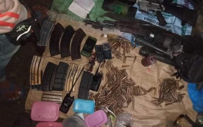 <p><strong>SEIZED ARMS</strong>. Five suspected members of the New People's Army were killed in a clash with government troops in Sitio Talingting, Barangay Luyang in Mabinay, Negros Oriental on Thursday (June 18, 2020). Shown in photo are high-powered firearms, ammunition and subversive documents recovered by police and military from the clash site<em>. (Photo courtesy of the Philippine Army's 3rd Infantry Division)</em></p>