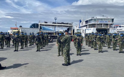 <p><strong>OFF TO CEBU CITY.</strong> Police officers from the Police Regional Office 8 (Eastern Visayas) hold a formation before boarding ships at the Ormoc City Seaport on Thursday (June 18, 2020). The police officers are part of the contingent deployed to enforce the enhanced community quarantine in Cebu City. <em>(Photo courtesy of PNP Public Information Office)</em></p>