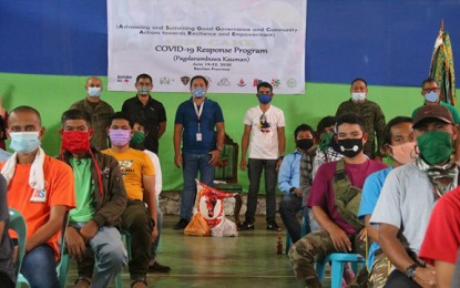 <p><strong>RELIEF AID</strong>. Sixty-five former members of the Abu Sayyaf Group in the municipality of Sumisip, Basilan province, receive Friday (June 19,<br />2020) relief goods and hygiene kits from Balay Mindanaw Foundation, Inc. The relief assistance is part of the Covid-19 response program of BMFI, which was assisted by the Army's 64th Infantry Battalion during the activity. <em>(Photo courtesy of 101st Infantry Brigade)</em><br /><br /></p>