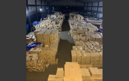 <p><strong>SEIZED FACE MASKS.</strong> A total of 200 boxes of KN95 face masks worth PHP21 million were confiscated from two Chinese nationals in an entrapment operation in Taguig City on Friday night (June 19, 2020). James Zhu and Charles Lee were also arrested for selling large quantities of KN95 face masks via phone call and text transactions.<em> (PNP PIO)</em></p>