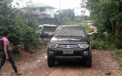 <p><strong>CHEATING DEATH.</strong> The muddied pick-up truck of Mayor Reynalbert Insular of South Upi, Maguindanao, after unidentified suspects set off a roadside bomb at 3 p.m. Monday (June 22, 2020) at the back of the town hall. Insular was not inside the car during the bomb attack. <em>(Photo courtesy of Jayjay Nable–South Upi)</em></p>