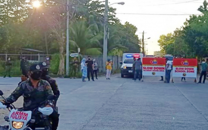 <p><strong>SECURITY CHECKPOINT.</strong> The police in Sultan Kudarat town, Maguindanao, puts up more checkpoints around town to ensure public safety following the clashes between Moro Islamic Liberation Front and Moro National Liberation Front factions in Barangay Macaguiling on Sunday (June 21, 2020). Local authorities say they are finalizing the schedule of the peace dialogue between the warring groups.<em> (Photo courtesy of Sultan Kudarat MPS)</em></p>