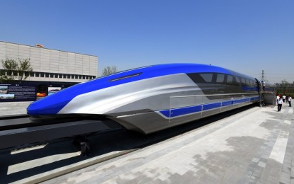 <p>Guests visit China's first high-speed maglev train testing prototype in Qingdao, east China's Shandong Province, on May 23, 2019. <em>(Xinhua/Li Ziheng)</em></p>