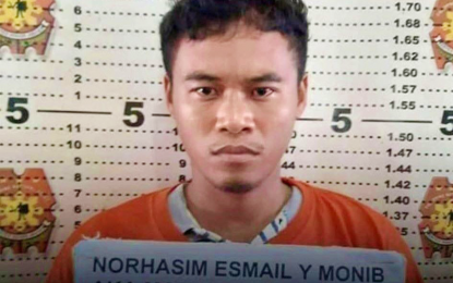 <p><strong>ARRESTED.</strong> A mug shot of bombing suspect Norhasim Esmael following his capture along the highway in Ampatuan, Maguindanao on Sunday (June 21, 2020). The suspect is linked to the Aug. 2018 bomb attack in Isulan, Sultan Kudarat that killed three civilians and injured 18 others.<em> (Photo courtesy of Ampatuan MPS)</em></p>