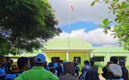 <p><strong>SYMBOL OF GOVERNANCE.</strong> The Philippine flag flies in front of the newly refurbished town hall of Talitay, Maguindanao on Tuesday (June 22) where local government function was absent during the past 12 months. Government forces helped restore normalcy in the town and install government functionaries in the town center once again after hampered by intermittent clashes among armed followers of local politicians. <em>(Photo courtesy of Maguindanao PPO)</em></p>