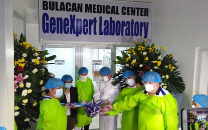 <p><strong>COVID-19 TESTING LAB.</strong> Bulacan Governor Daniel Fernando (third from right), Dr. Hjordis Marushka Celis, Provincial Health Officer II (2nd from left), together with some public officials, lead the inauguration of the first Covid-19 testing laboratory in Malolos City on Thursday (June 25, 2020). Known as the Bulacan Medical Center GeneXpert RT-PCR Laboratory, it is located at the compound of the government-run Bulacan Medical Center in Malolos.<em> (Photo by Manny Balbin)</em></p>