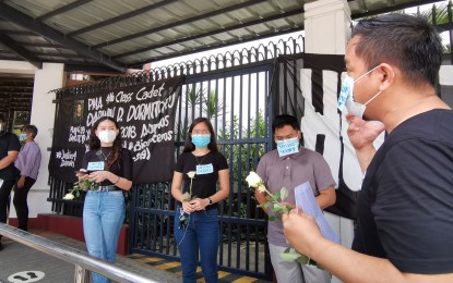 <p><strong>JUSTICE FOR DARWIN.</strong> Members of the Xavier University in Cagayan de Oro hold a gathering to offer prayers for killed Philippine Military Academy cadet Darwin Dormitorio, an alumnus of the school,  on Friday (June 26, 2020). Prosecutors indicted several suspects in the cadet's death. (<em>Photo courtesy of Jerome Torres)</em></p>