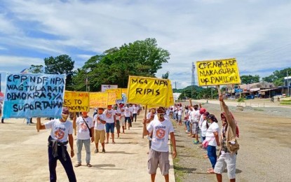 <p><strong>MARCH FOR PEACE.</strong> Some 150 former supporters of the communist rebel movement in the Davao de Oro town of Laak hold a march rally on Sunday (June 28, 2020) to condemn atrocities of the Communist Party of the Philippines-New People’s Army-National Democratic Front. The rallyists also declared the communist rebels as persona non grata in the town. <em>(Photo courtesy of the Army's 10th Infantry Division)</em></p>