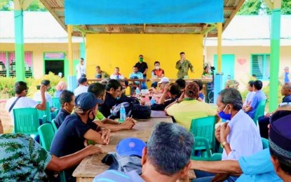 <p><strong>CLAN WAR SETTLEMENT.</strong> Members of Muslim families in Palimbang town, Sultan Kudarat, who are locked in family feud agreed to an Army-initiated dialogue to end their misunderstanding and sign a peace deal on Tuesday (June 30, 2020). In coordination with the local government, the Army’s 37th Infantry Battalion facilitated the 'rido' (clan war) settlement among members of two Moro Islamic Liberation Front units in the area.<em> (Photo courtesy of 37IB)</em></p>