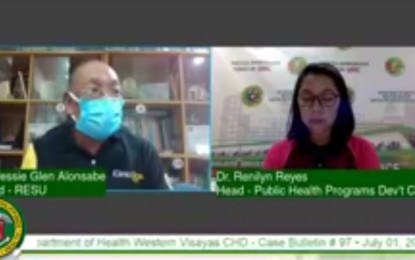 <p><strong>QUARANTINE</strong>. Dr. Renilyn Reyes (right), head of the public health programs development cluster of the Department of Health Western Visayas Center for Health Development (DOH-CHD6), says on Thursday (July 2, 2020) that individuals who undergo swab test should have themselves quarantined. Dr. Jessie Glen Alonsabe (left) said the case in the town of Alimodian is being considered as local transmission. <em>(Photo by DOH-CHD 6)</em></p>