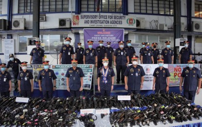 <p><strong>ARMS HAUL.</strong> Police officials present a total of 584 unlicensed firearms confiscated during the first six months of 2020 in Camp Crame, Quezon City on Friday (July 3, 2020). The PNP Civil Security Group will intensify its crackdown against unlicensed firearms amid the Covid-19 pandemic. <em>(Photo courtesy of PNP Civil Security Group)</em></p>