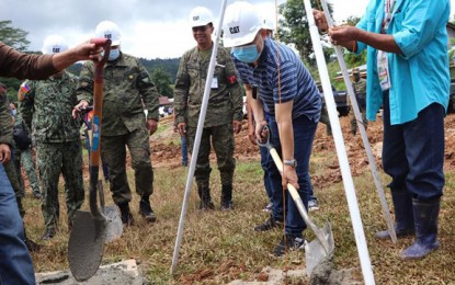 <p><strong>PEACE PROJECTS.</strong> Zamboanga del Sur Gov. Victor Yu (in blue shirt) leads the groundbreaking ceremony Thursday (July 2, 2020) of three priority farm-to-market road projects of the Provincial Task Force to End Local Communist Armed Conflict in Lakewood, town Zamboanga del Sur. The projects aim to spur economic development and put an end to the insurgency problem in the area. <em>(Photo courtesy of the Army's 1st Infantry Division Public Affairs Office)</em></p>