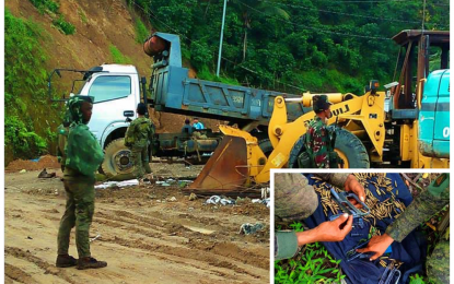 <p><strong>HEAVY GUARD</strong>. Soldiers secure the heavy equipment of the JANMERC road construction firm in Kalamansig, Sultan Kudarat after a foiling an attempt by communist guerillas to set ablaze trucks, backhoe, and other construction equipment in Barangay Hinalaan on Friday (July 3, 2020). (Inset) The guerillas left behind gun components and empty shells from firearms after an encounter with responding government troopers. <em>(Photo courtesy of 37IB)</em></p>