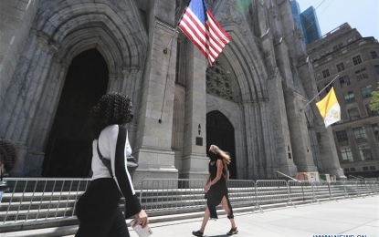 <p><strong>COVID-19 CASES</strong>. Pedestrians walk past St. Patrick's Cathedral on Fifth Avenue in New York, the United States, July 4, 2020. The Covid-19 cases in the US topped 2.8 million, according to the Center for Systems Science and Engineering (CSSE) at Johns Hopkins University. (Xinhua/Wang Ying)</p>