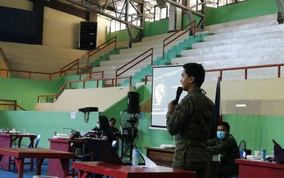 <p><strong>MONITORING CNTs</strong>. Civil-Military Relations Officer, 1Lt. Gil Gamay, of the Philippine Army 61st Infantry Battalion, requests barangay captains in Antique to help monitor activities of the Communist Party of the Philippines-New People’s Army Terrorists (CNTs). In a meeting with the barangay captains and the Inter-Agency Task Force for Covid-19 at the Binirayan Gymnasium in San Jose de Buenavista on Tuesday (July 7, 2020), Gamay said 35 non-violent activities of the CNTs were monitored during the first semester of 2020. <em>(PNA photo by Annabel Consuelo J. Petinglay)</em></p>