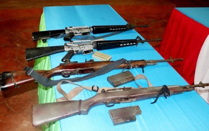 <p><strong>SURRENDER.</strong> The firearms belonging to the four members of the Barangay Peacekeeping Action Team who are tagged as responsible in the July 3 killing of a soldier and three others in Barangaay Bohe Lebbung, Tipo-Tipo, Basilan. The suspects surrendered to military authorities Sunday (July 5, 2020). <em>(Photo courtesy of the Army's 101st Infantry Brigade)</em></p>