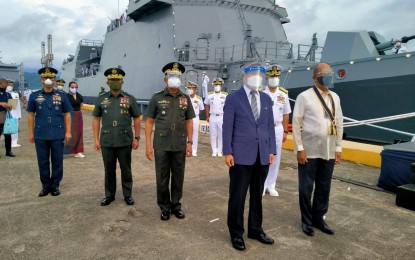 <p><strong>COMMISSIONING RITES.</strong> Defense Secretary Delfin Lorenzana (in barong), South Korean Ambassador to Manila Han Dong-man (in blue suit), and ranking Philippine military officials lead the handover, christening, and commissioning ceremony for the Philippines' first missile-frigate, the BRP Jose Rizal, at the Alava Wharf in Subic Bay, Zambales on Friday (July 10, 2020). Navy chief, Vice Adm. Giovanni Carlo Bacordo said the acquisition of the BRP Jose Rizal highlights the government's commitment to protecting the country's territory. <em>(Photo courtesy of DND)</em></p>
