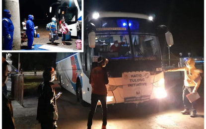 <p><strong>HOME BY BATCHES.</strong> The buses that brought locally stranded individuals and returning overseas Filipinos in the Soccsksargen region on Wednesday and Thursday (July 9, 2020) arrived at the provincial hospital compound in Isulan, Sultan Kudarat. The residents underwent rapid tests for coronavirus disease 2019 before allowed to proceed to their home provinces by respective Inter-Agency Task Force on Covid-19 personnel. <em>(Photo courtesy of Sultan Kudarat Governor Suharto Mangudadatu)</em></p>