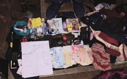 <p><strong>SEIZED</strong>. The firearms and explosives, cash, and other items seized from four officials of the Communist Party of the Philippines - New People’s Army (CPP-NPA) who were arrested in Kabankalan City, Negros Occidental on July 10, 2020. Maj. Gen. Eric Vinoya, commander of the 3rd Infantry Division, on Tuesday (July 14, 2020) called their arrest a huge blow to the communist-terrorist group. <em>(Photo courtesy of the 15th Infantry Battalion, Philippine Army)</em></p>