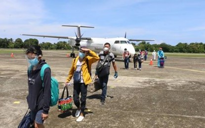 <p><strong>LSIs AT ANTIQUE AIRPORT</strong>. A total of 90 passengers of the Philippine Airlines (PAL) arrive at the Antique Airport on Wednesday (July 15, 2020). PAL resumes its operation after the Department of the Interior and Local Government issued an advisory lifting the travel ban on locally stranded individuals effective July 15. <em>(Photo courtesy of Antique PIO)</em></p>